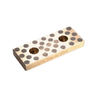 Kluzná destička samomazná s otvory pro dva šrouby